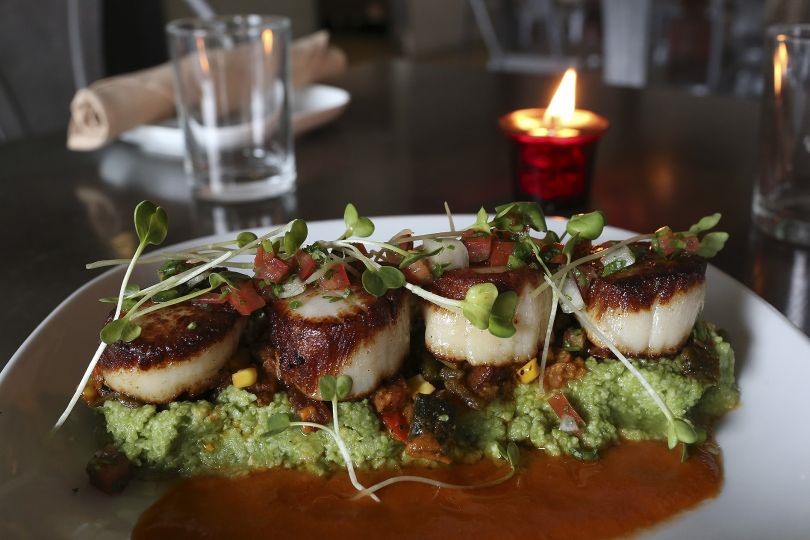 An amazing scallop meal from the Arcade Midtown Kitchen, one of the restaurants in San Antonio