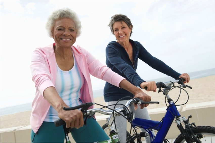 Two female senior citizens on bikes