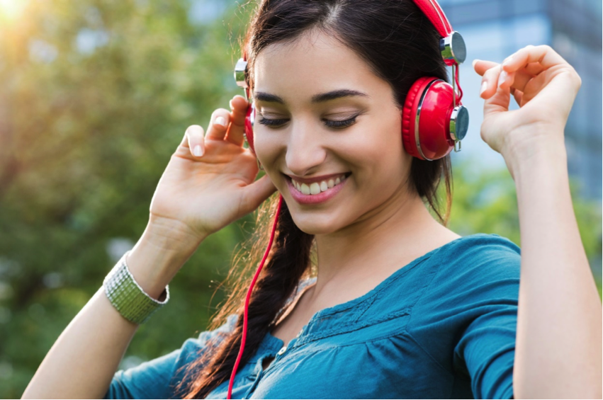 Young woman dancing outside