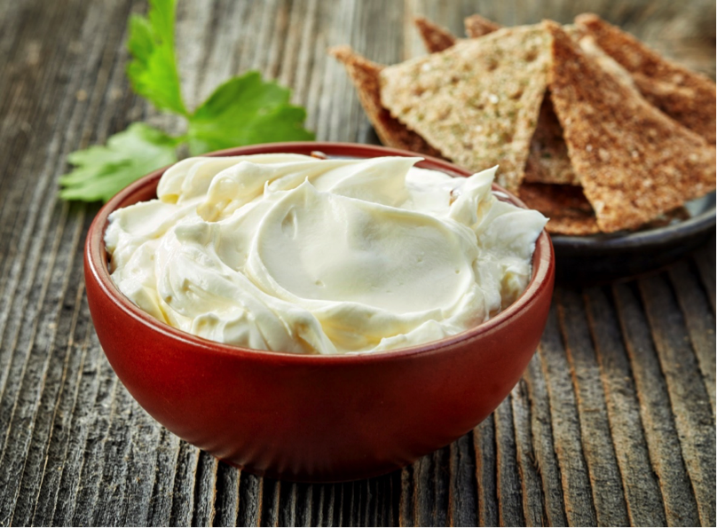 Low carb chips and dip on a table