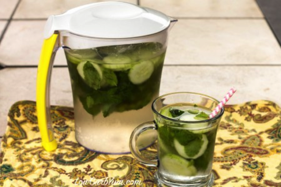 Low-carb cucumber mint infused water pitcher and glass for barbecue
