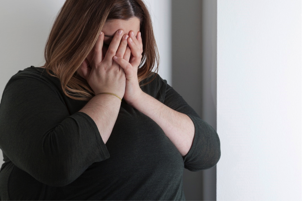 Woman stressed about weight gain
