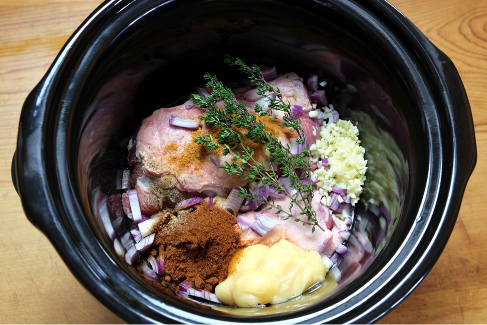 A slow cooker with food ingredients for parents on the go watching their back-to-school health.