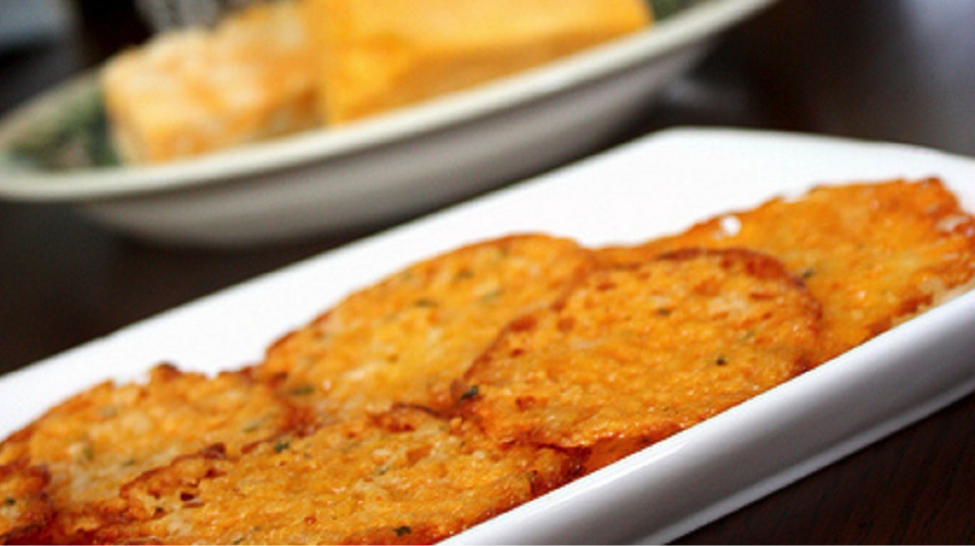 Cheese crisps on plate for a healthy tailgating experience.