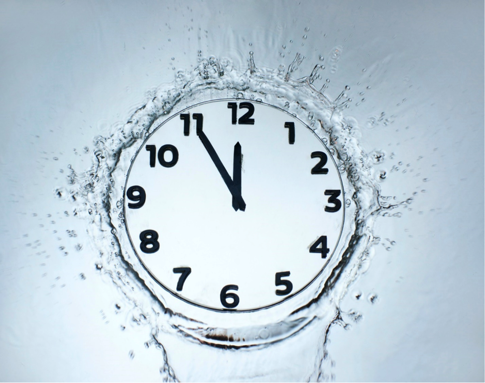 Clock surrounded by water