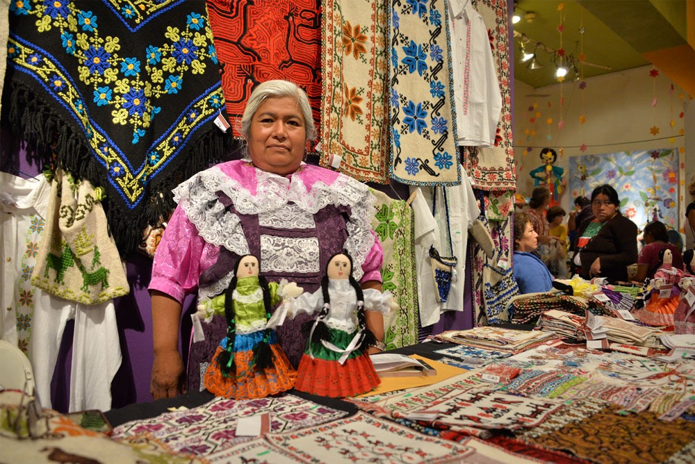 Woman dressed up at the San Antonio event, International Peace Market