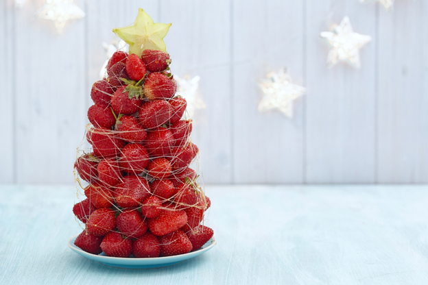 Strawberries forming a Christmas tree for a ketogenic Christmas