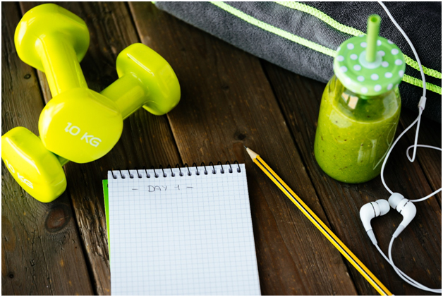 weights, drink, and planner to help achieve new year’s health bucket list